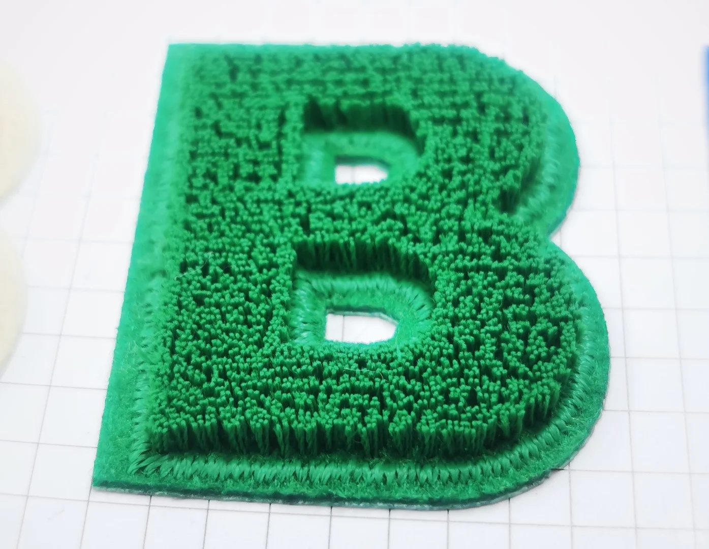 Cap Embroidery on Curved Surfaces
